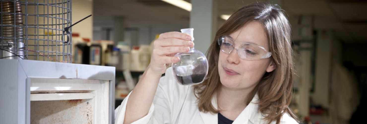 Image of GCCE scientist working in a laboratory on the Brocklesby project