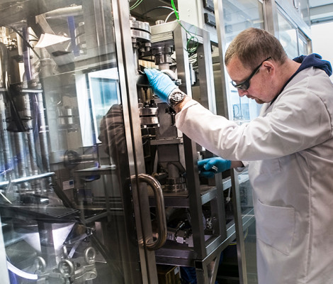 Image of scientist, Peter Hurst, working in a laboratory at the Biorenewables Development Centre