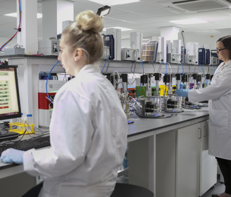 Image of scientists Rosie Nolan and Alex Jukes in a laboratory at the Biorenewables Development Centre